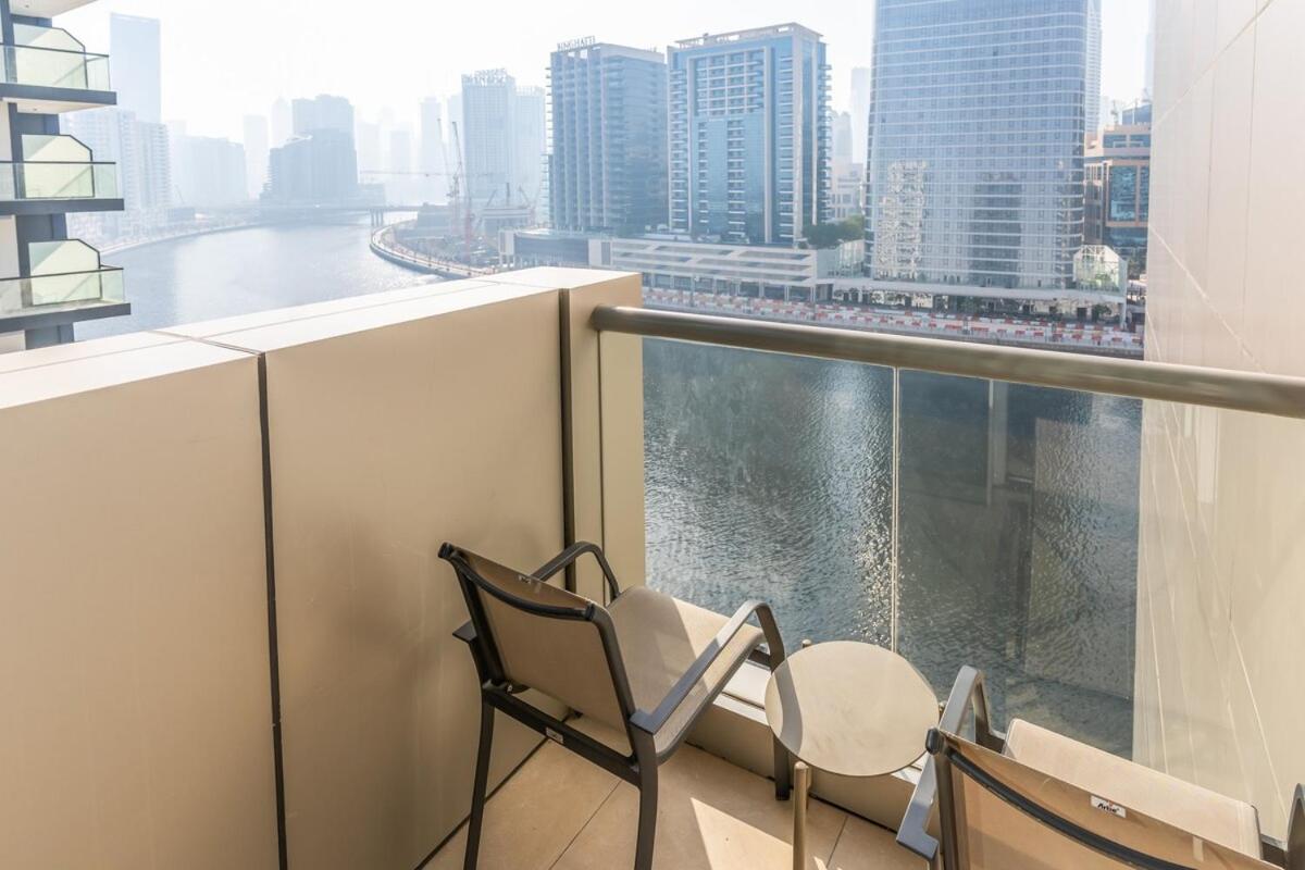 Stunning 2br Canal & Burj View W & Infinity Pool *